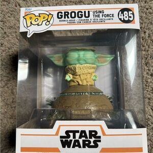 Funko Grogu Using The Force Green and Tan Pop! Figure